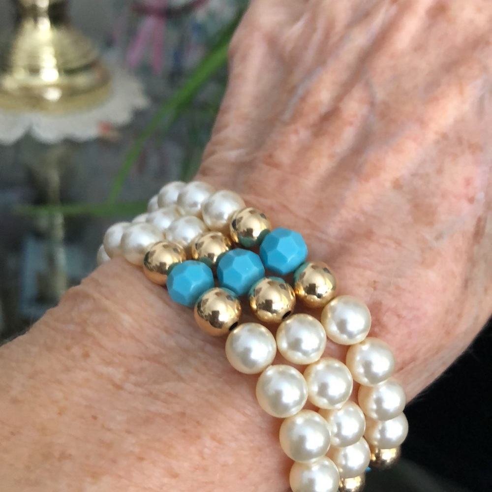 Combined gold filled, creamy Pearl, and faceted turquoise beads in triple wrap.